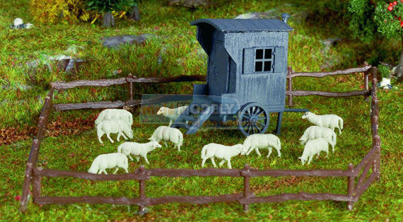 Pastýřův vůz a stádo ovcí