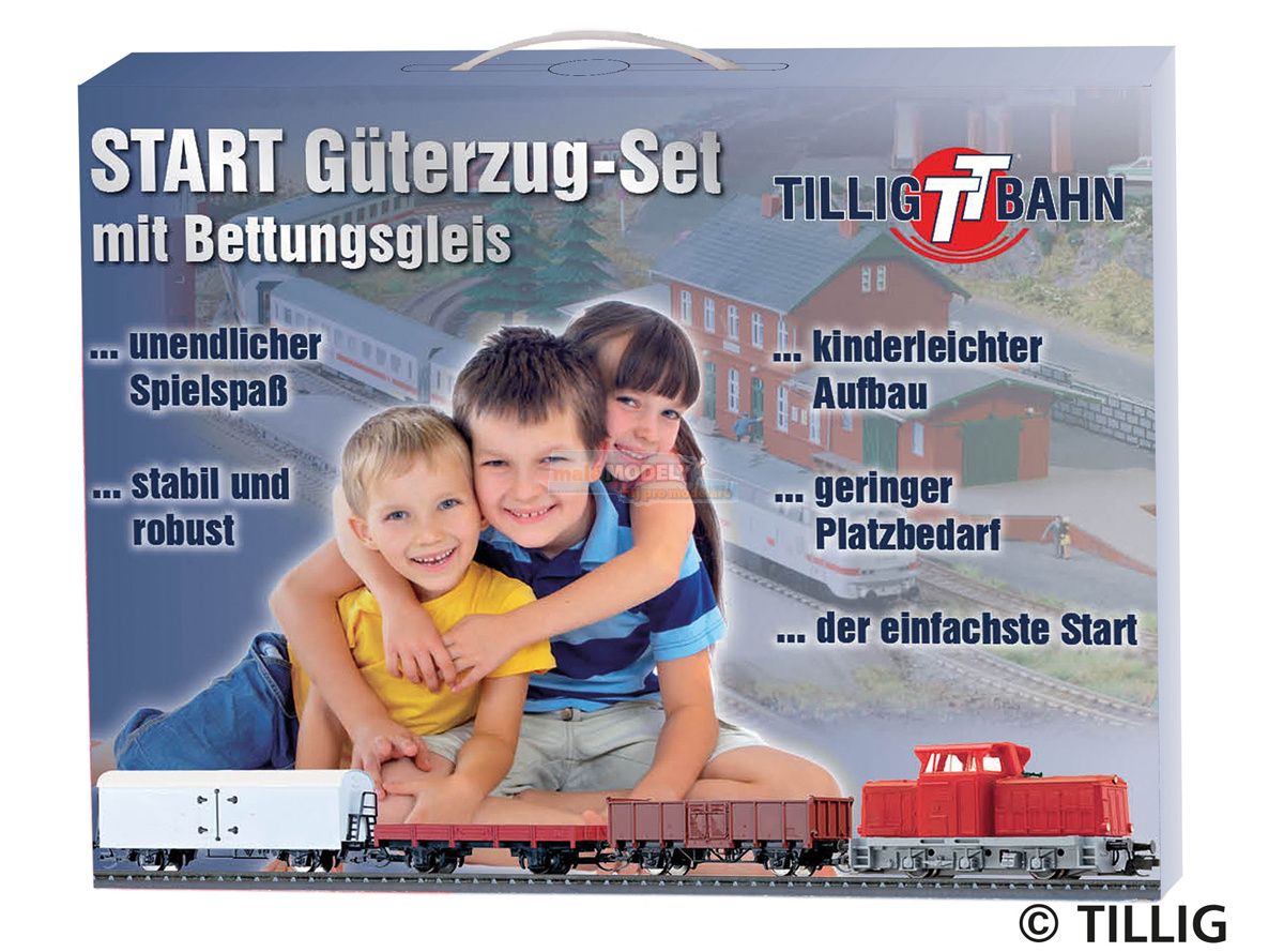 Start set - dieselová lokomotiva T334 se 3 nákladními vozy + koleje + regulátor